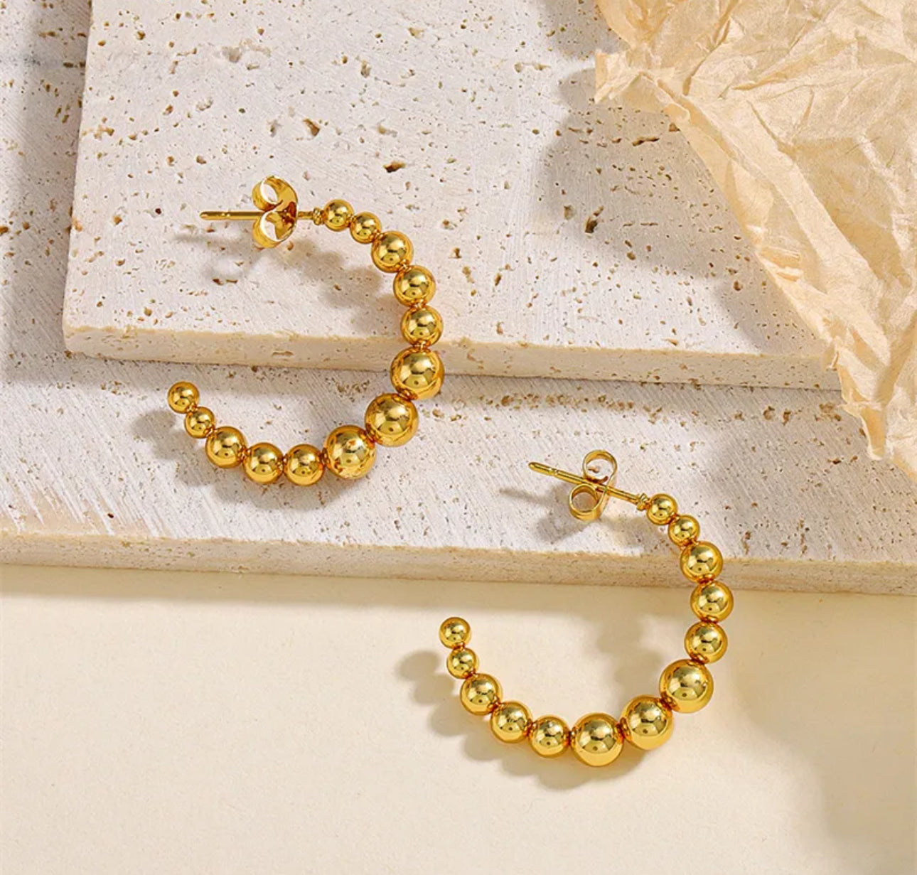 Pendientes Cora