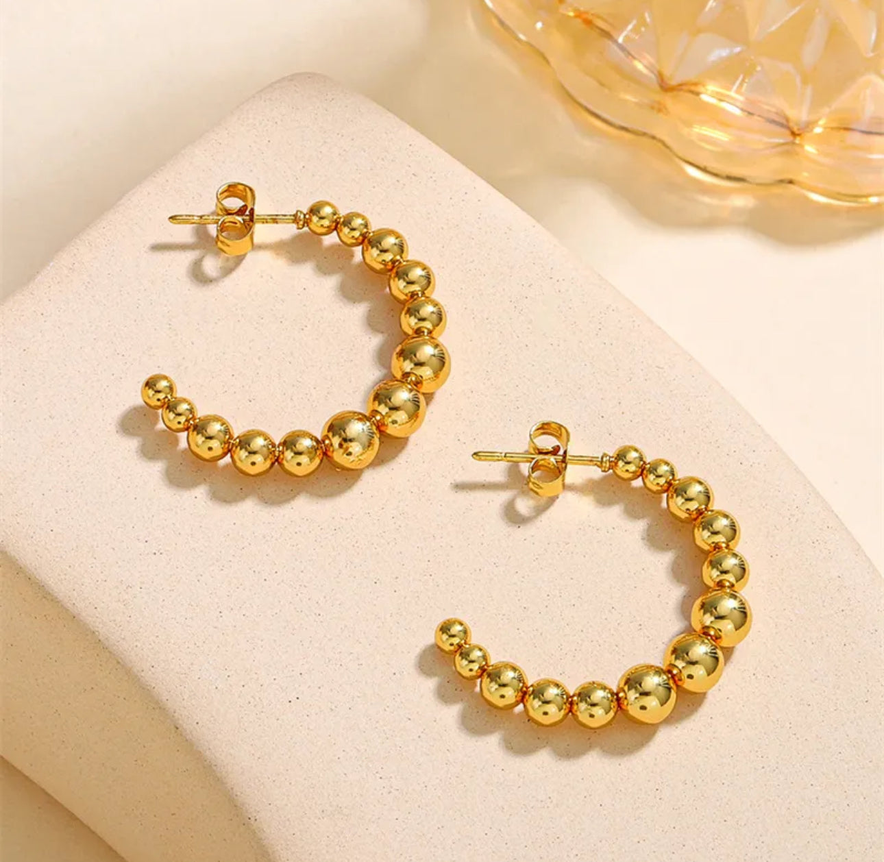 Pendientes Cora
